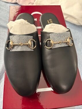 Gucci Black Leather Horsebit Slide Mules with silver Hardware